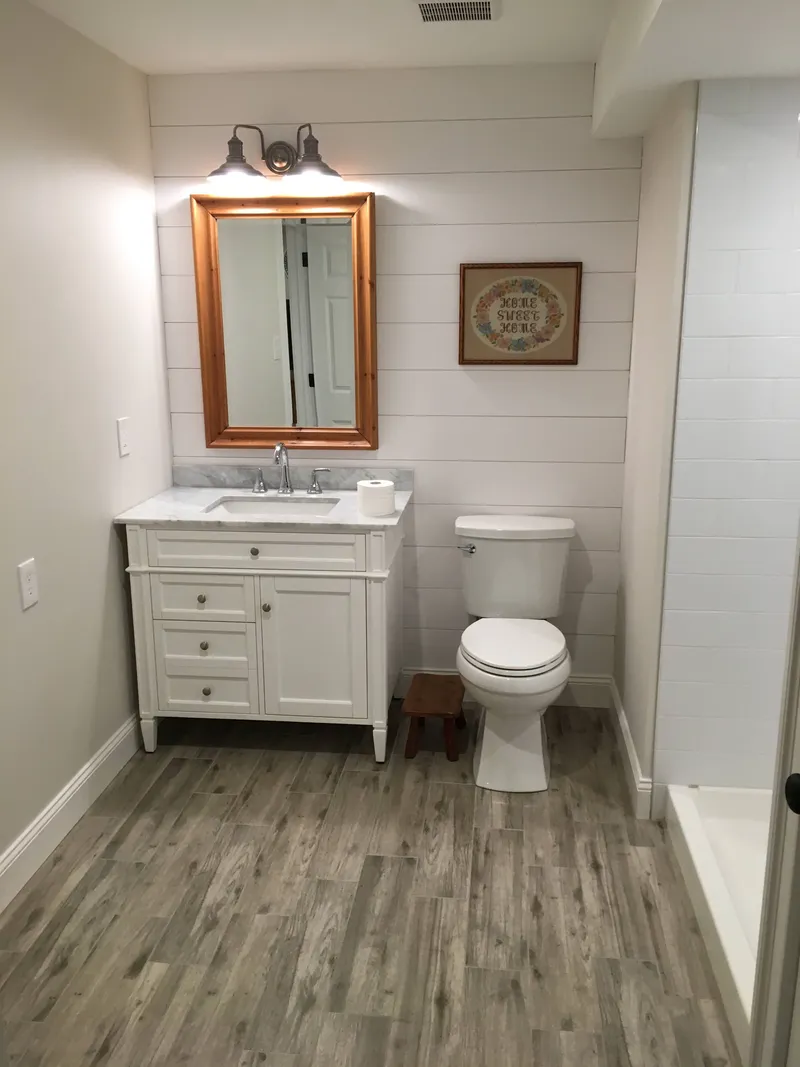 Bathroom remodeling with elegant tile work and modern fixtures